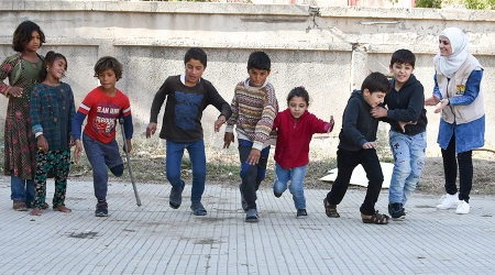 conducted recreational activities for children staying in the collective shelter