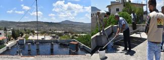 Repairing the roof of the medical point at al-Twaheen, Cadmus