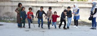 conducted recreational activities for children staying in the collective shelter